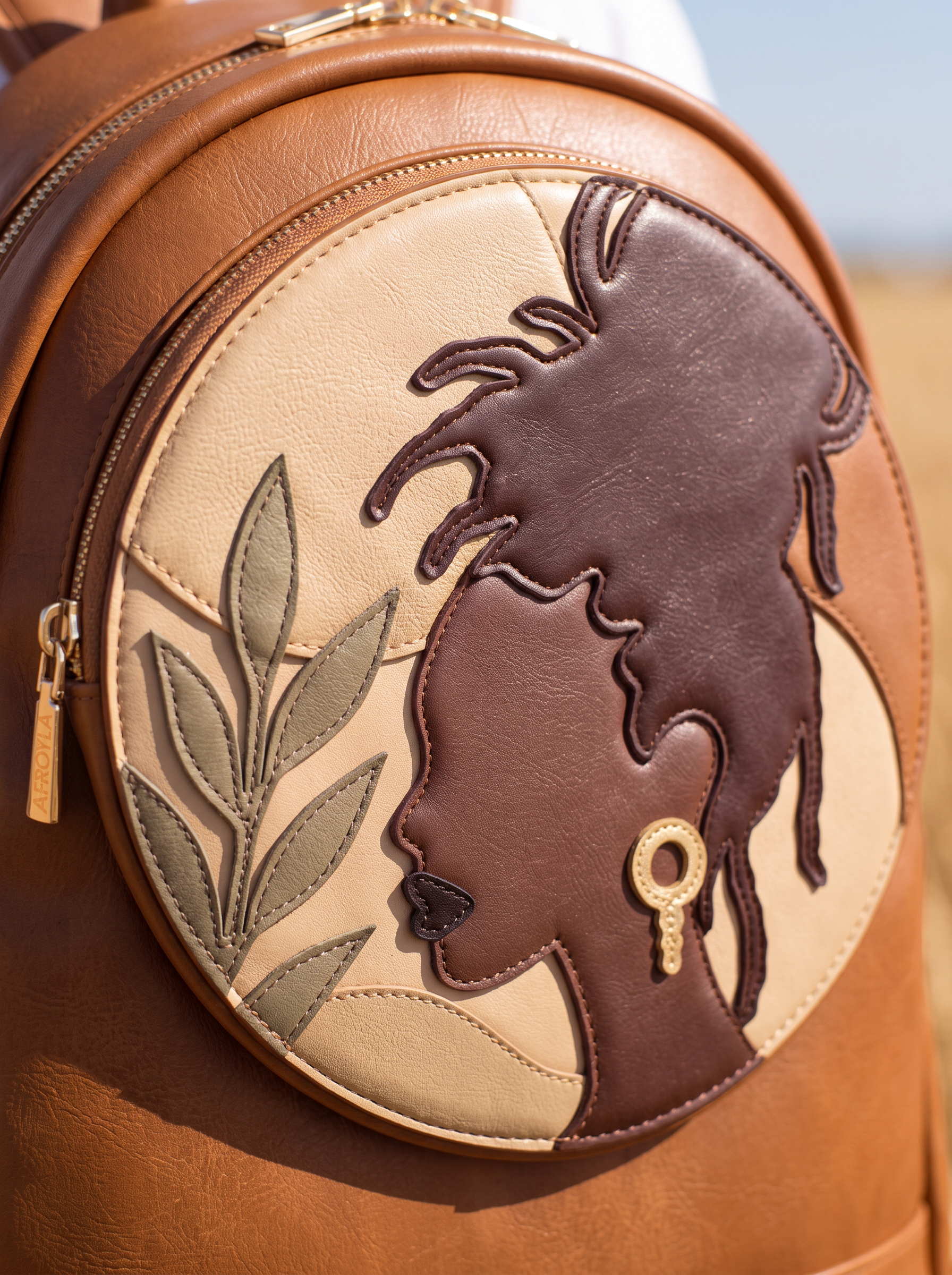 "Subira" Applique Leather Backpack